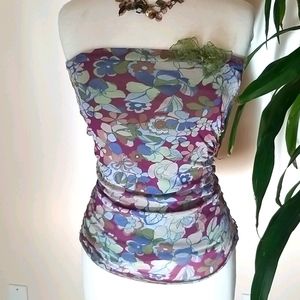 Nylon strapless top with built in bralette.